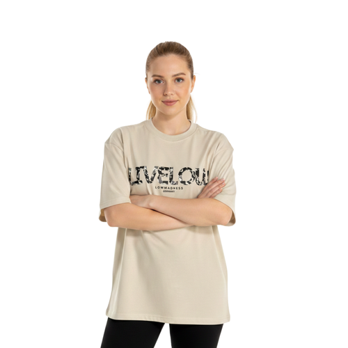 Oversized 220gsm heavyweight cotton graphic t-shirt in heather grey. Features a bold tri-color artistic streetwear design on the chest. Model is wearing a boxy fit, premium cotton tee with a modern drop-shoulder silhouette.